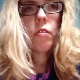 A blonde girl wearing glasses records her ugly facial expressions as she takes a shit sitting on a toilet. Plopping sounds can be heard, but no action or product is shown. See movie 8893 and 8448 for more. About a minute.